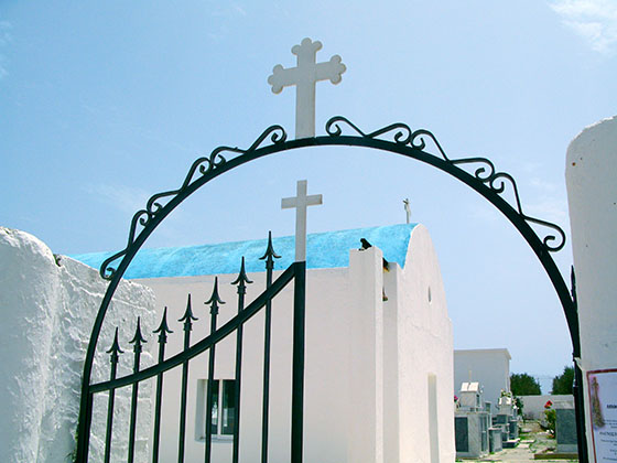 Further away, a chapel inside a cemetery